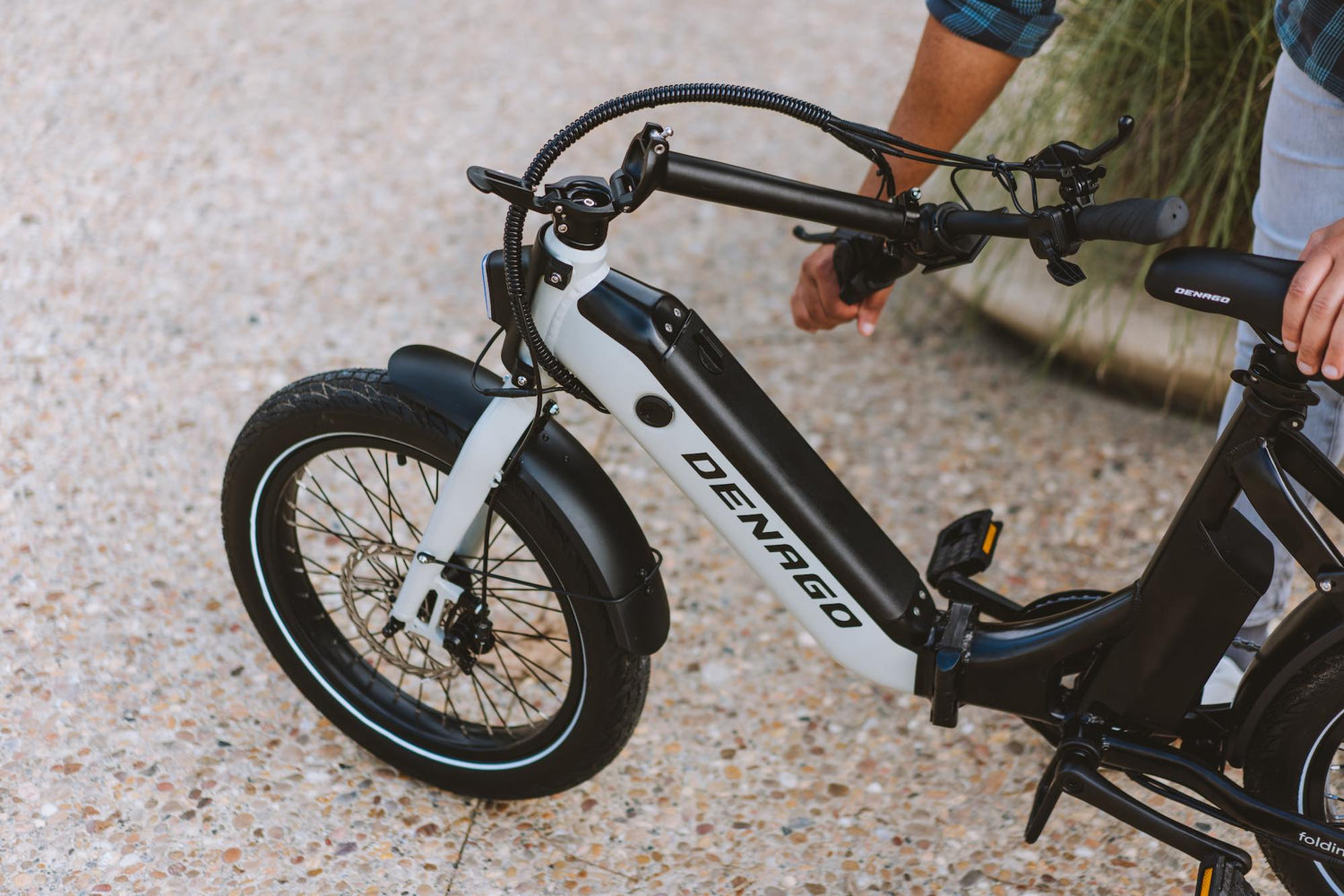 start by lowering the saddle and handlebar