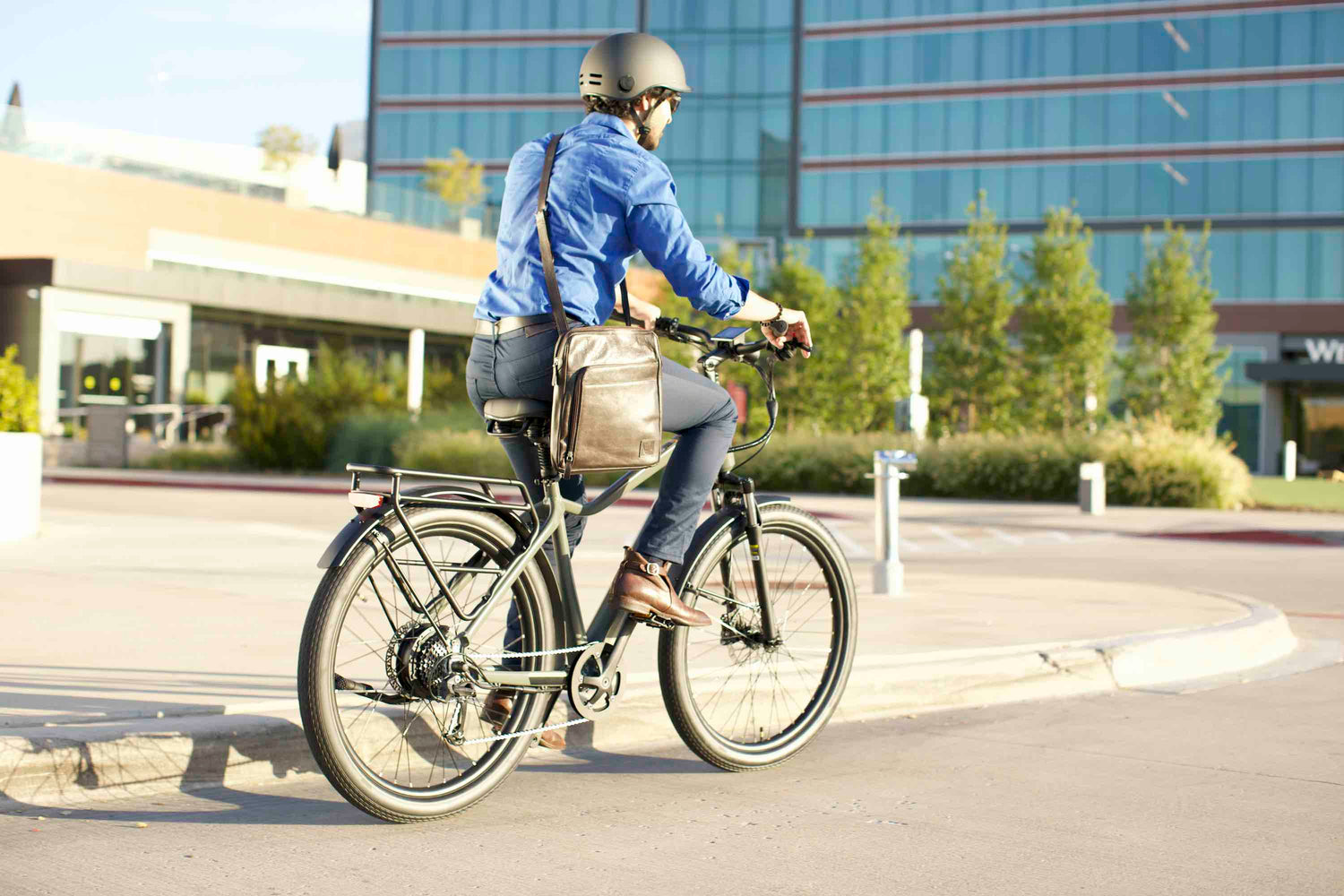 Man with a briefcase riding an eBike