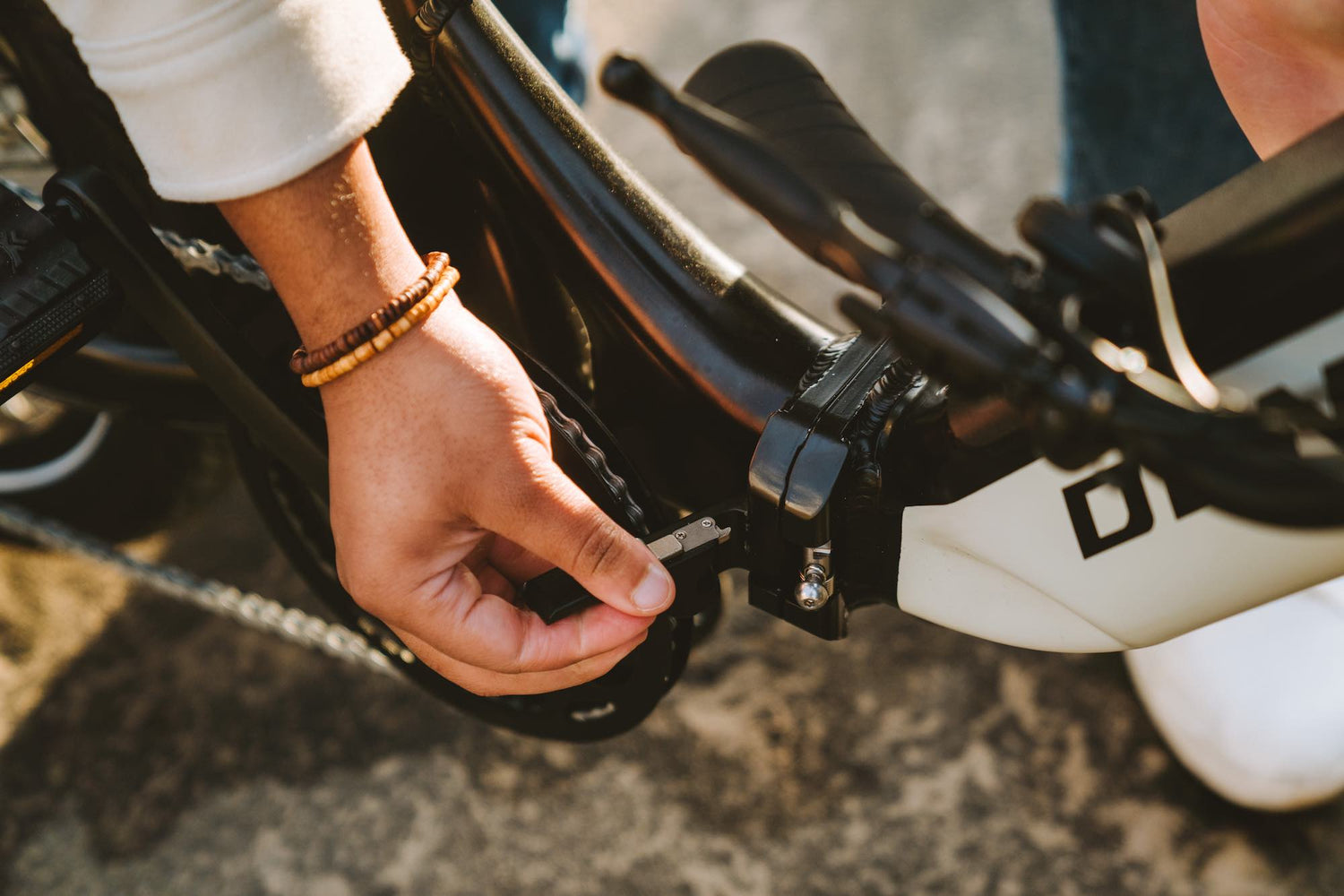 Then release the hinge and fold the frame