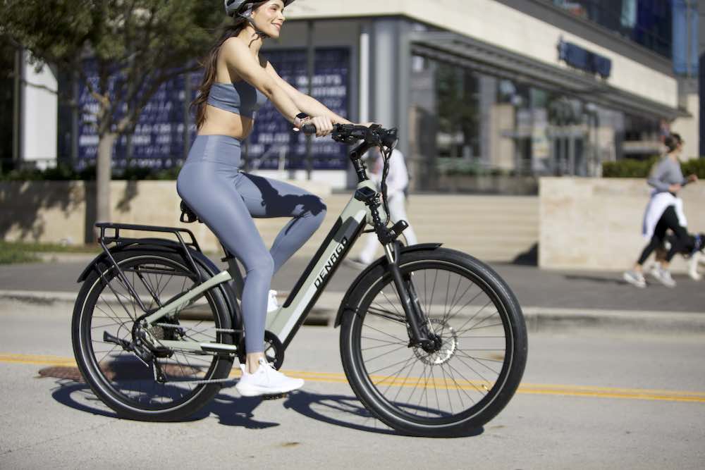 woman with Denago Commute Model 1 eBike in Dallas