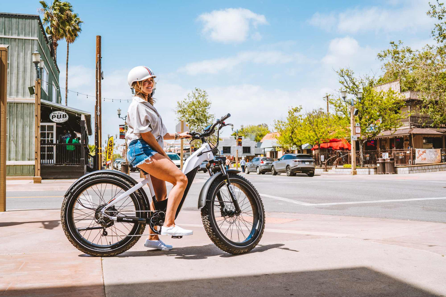 Woman with an eBike in downtown Temecula